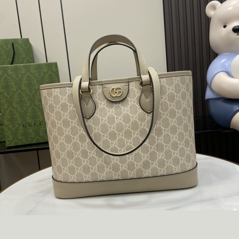 G*u*i shopping bags